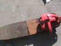 Chainsaw powered motorized skateboard